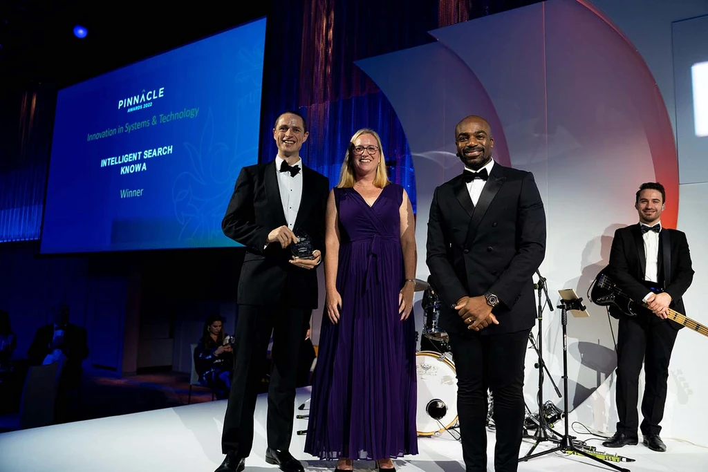 Pinnacle Awards 2022 — Knowa collecting the award on stage